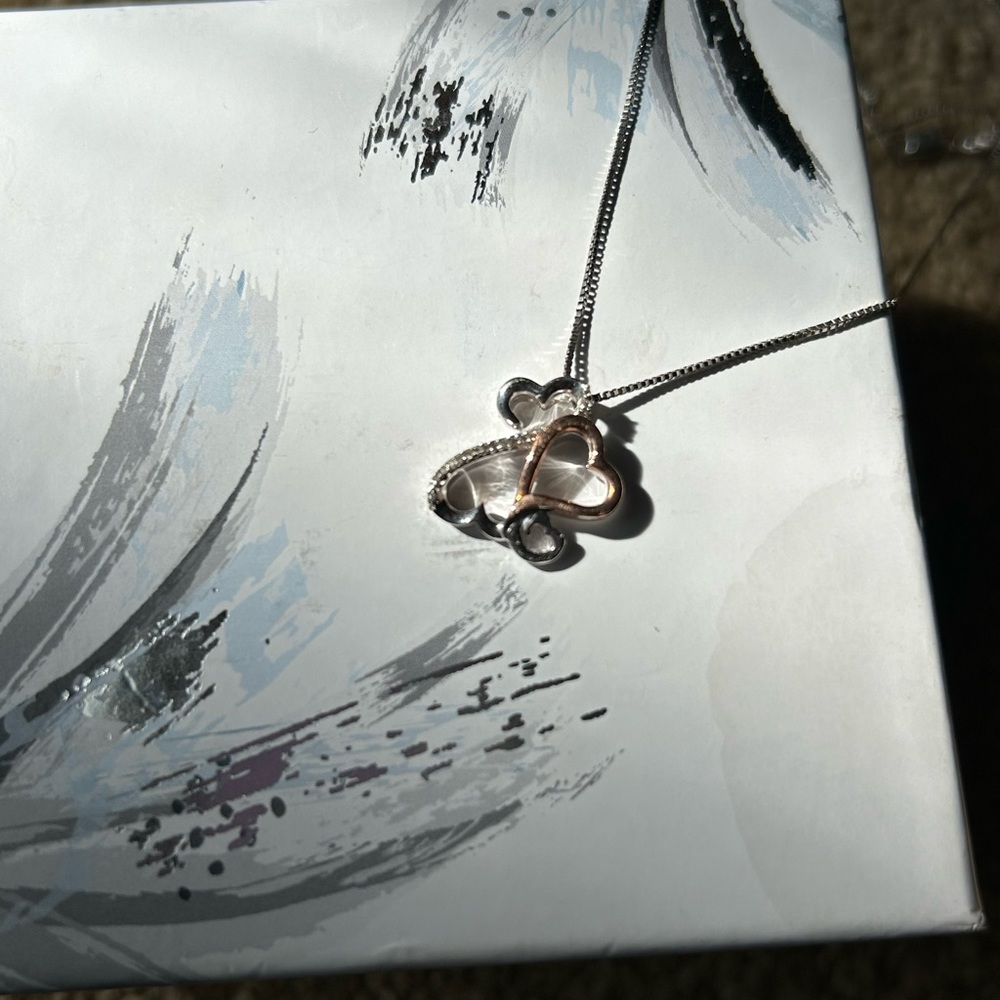 Heart pendant, necklace, rose gold and diamonds